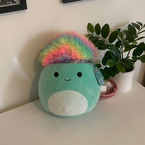Squishmallow pride dinosaur